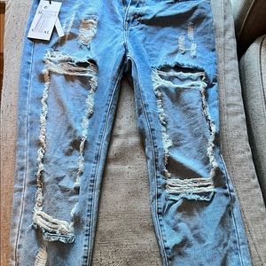 Designer redial distressed boyfriend blue jeans. Sz 38z. With tags